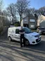 David Crombie beside his van